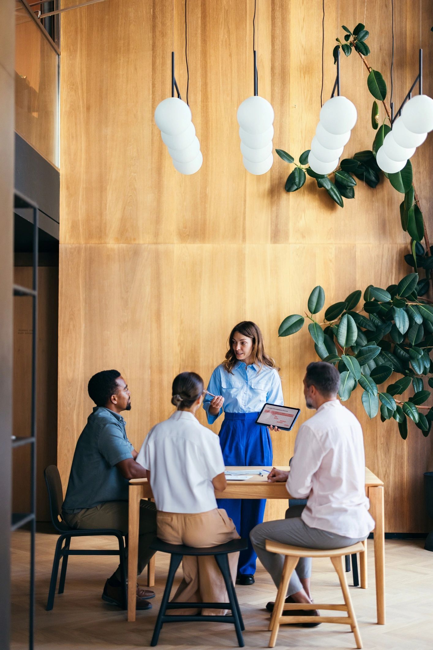 First Connect leadership team collaborating in a modern office